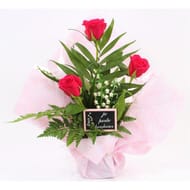 Composition landes en corolle 3 brins de muguet + 3 roses