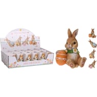 Lapin assis avec oeuf