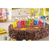 Gâteau happy birthday avec ses bougies