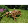 Table forestiere en bois avec bancs rabattables